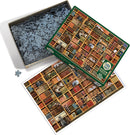 The Cat Library jigsaw puzzle by Cobble Hill, featuring a detailed image of a bookshelf filled with colorful books and playful cats. The puzzle box is open, with pieces scattered and a visual reference of the completed puzzle beside it.