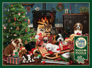 A festive holiday scene featuring various playful puppies surrounded by Christmas decorations. The puppies are in front of a decorated tree, presents, and a cozy fireplace, capturing the warmth and joy of the holiday season. This jigsaw puzzle by Cobble Hill contains 1000 pieces and includes a poster.