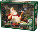 A jigsaw puzzle titled 'Santa Painting Cars' by Cobble Hill, featuring Santa Claus joyfully painting toy cars in a cozy workshop, surrounded by Christmas decorations and tools. The scene captures a festive and artistic atmosphere, perfect for puzzle enthusiasts and holiday lovers.