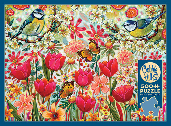 Shooting the Breeze jigsaw puzzle by Cobble Hill featuring a vibrant and colorful design with blooming flowers, butterflies, and beautiful birds, ideal for puzzlers of all ages. The puzzle comprises 500 pieces and includes a poster for reference.