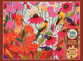 A colorful jigsaw puzzle titled 'Springtime Goldfinches' by Cobble Hill. The image features two vibrant goldfinches among a lush backdrop of blooming flowers in shades of orange, pink, and green. This 275-piece puzzle includes a poster for reference, highlighting the cheerful and artistic design perfect for nature lovers.