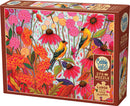 The Springtime Goldfinches jigsaw puzzle by Cobble Hill features a vibrant illustration of two goldfinches amidst a colorful array of flowers in shades of red, pink, and yellow. The box displays intricate floral patterns and includes large pieces for easy handling, along with a poster of the design.