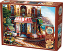 Cobble Hill jigsaw puzzle titled 'Chez Michelle'. This vibrant 275-piece puzzle features a charming street scene with a bistro, flowers, and outdoor seating, perfect for families and puzzle enthusiasts. Includes a poster for reference.