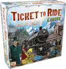 Ticket to Ride: Europe board game by Days of Wonder, featuring an illustrated box with a vintage steam train and whimsical characters dressed in period attire, set against a backdrop of mountains and a quaint village.