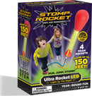 The Ultra LED Stomp Rocket box featuring two excited children jumping. The packaging highlights the product's features: '100% Kid Powered', soars up to 150 feet, and suggests learning about gravity, trajectory, and air power through play. Includes four foam rockets and is suitable for ages 6 and up.