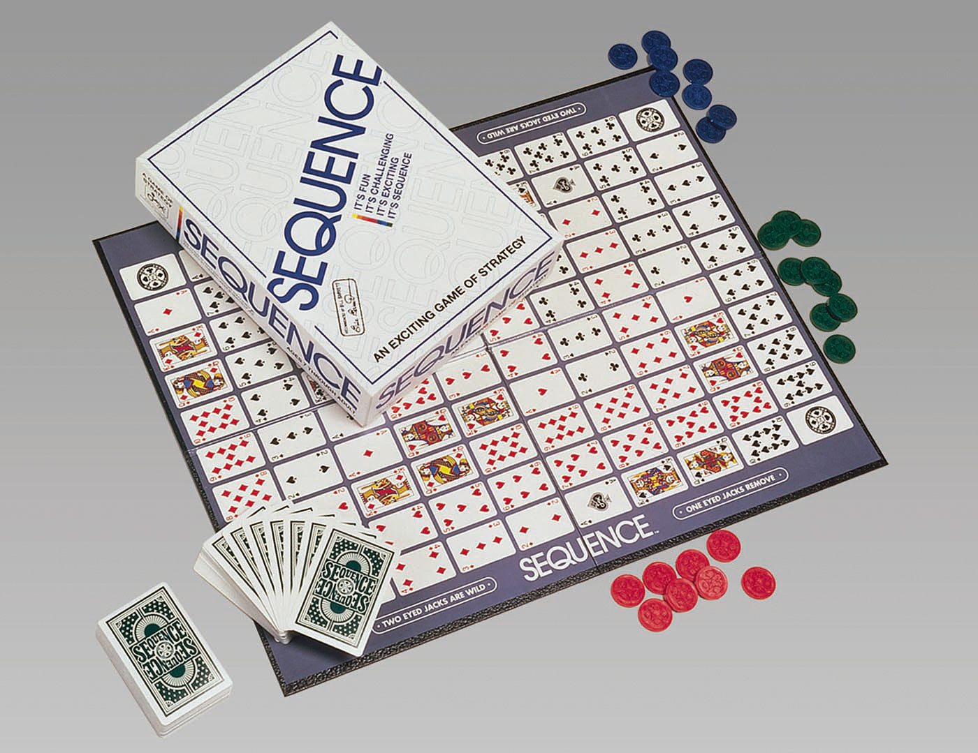 The Sequence game by Pressman Toy Corp featuring a board with a grid layout of playing cards, a box displaying the game's title, and stacks of colored tokens in red, green, and blue. A deck of Sequence playing cards is also visible, emphasizing strategic gameplay.