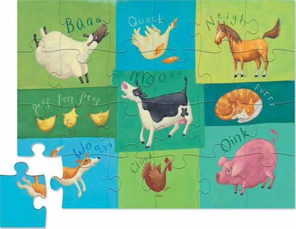 A colorful 24-piece jigsaw puzzle featuring various barnyard animals including a sheep, duck, horse, cow, dog, cat, chicken, turkey, and pig. Each animal is depicted in vibrant colors with their sound written beside them, such as 'Baa,' 'Quack,' and 'Moo.' The puzzle pieces are intricately shaped, joining together to form a delightful pastoral scene. A single puzzle piece is shown detached from the main puzzle.