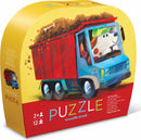 Go Big Dog 12-piece jigsaw puzzle by Crocodile Creek featuring a colorful truck driven by a cartoon dog, great for children aged 2 and up. The puzzle promotes creativity and fine motor skills, ideal for young animal lovers.