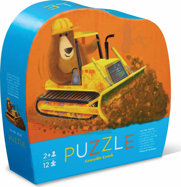 Go Mr. Bear 12-piece jigsaw puzzle by Crocodile Creek, featuring a playful bear in a construction helmet operating a bulldozer, designed for children aged 2 and up. The colorful and engaging packaging showcases the fun, educational aspect of this puzzle, making it a perfect gift for young puzzlers.