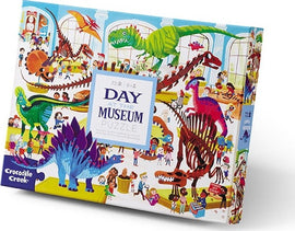 Day at the Dinosaur Museum jigsaw puzzle by Crocodile Creek featuring colorful illustrations of dinosaurs, children, and museum scenes, designed for ages 6 and up.
