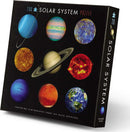 Crocodile Creek Solar System Jigsaw Puzzle featuring vivid images of planets in our solar system. The puzzle includes 200 pieces and showcases stunning NASA photography of each planet, including Saturn, Mars, and Earth. Ideal for kids and adults who enjoy space-themed activities.