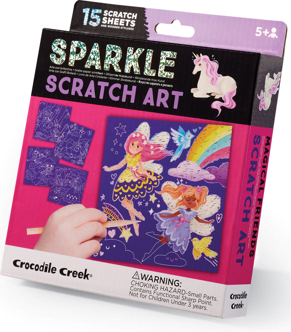 Sparkle Scratch Art Magical Friends by Crocodile Creek. The packaging features colorful illustrations of unicorns and fairies, along with scratch sheets and wooden styluses. Suitable for ages 5 and up, it encourages creativity and imaginative play.
