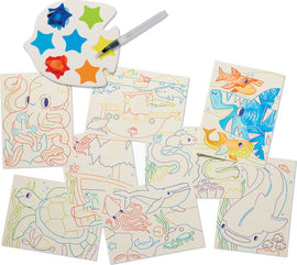 A vibrant DIY watercolor kit titled 'Watercolor Magic Ocean Adventure' by Crocodile Creek. The set includes a palette with five vivid colors and a water brush. There are several illustrated sheets featuring marine life such as an octopus, turtles, and sharks ready to be painted. Ideal for creative activities that inspire imagination and artistic expression.