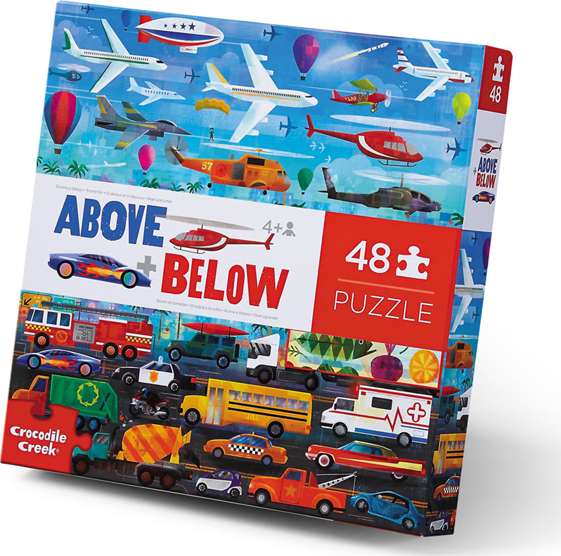 Crocodile Creek's Above & Below jigsaw puzzle featuring colorful illustrations of various vehicles in the sky and on the ground. The puzzle comes in a colorful box displaying a range of airplanes, helicopters, cars, and other transportation modes, designed for children aged 4 and up with 48 pieces.