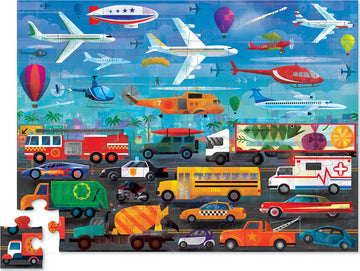 A colorful jigsaw puzzle titled 'Above & Below - Things That Go' by Crocodile Creek, featuring various modes of transportation including airplanes, helicopters, cars, and trucks, set against a vibrant backdrop of a city with a blue sky and palm trees.