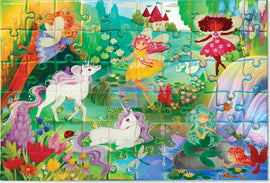 A colorful jigsaw puzzle featuring a magical scene with fairies, unicorns, and vibrant flowers in a whimsical forest setting. The puzzle showcases a variety of enchanting characters including a yellow fairy, a red fairy, and a serene mermaid, surrounded by a tranquil landscape with a castle in the background.