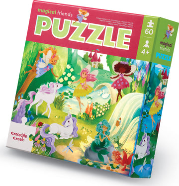A colorful jigsaw puzzle box featuring the title 'Magical Friends'. The illustration shows fairies, unicorns, and a scenic landscape with a castle, flowers, and a pond. The artwork is vibrant and whimsical, suitable for children over 4 years old.