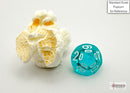 Translucent teal and white polyhedral die showing numbers, alongside a standard-scale popcorn piece for size reference, emphasizing its gaming use.