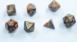 Set of Mini Lustrous RPG Dice in Gold and Silver, featuring various shapes including d20, d12, d10, d8, d6, and d4. The dice showcase shimmering colors with intricate engraved numbers, perfect for tabletop RPG gaming.