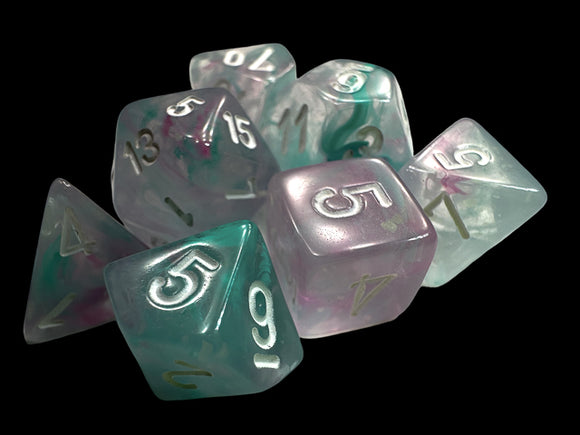 A vibrant collection of Mini Nebula RPG dice in Wisteria and White, featuring a mix of translucent and iridescent finishes. The set includes various polyhedral shapes, with shimmering numbers in gold that contrast beautifully against the colorful swirls of purple and teal. Perfect for tabletop role-playing games.