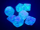 A vibrant collection of Mini Nebula RPG dice in Wisteria and White colors, featuring a unique translucent design with swirling patterns and luminous glow. The set includes various polyhedral shapes, showcasing numbers in a striking pink hue against a sparkling background. Ideal for tabletop gaming enthusiasts, these dice add a magical touch to any RPG session.