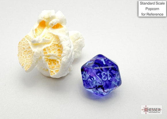 Nebula mini poly nocturn blu gaming die by Chessex displayed alongside a piece of popcorn for scale. The die features a deep blue color with a swirling pattern and white numbers, ideal for tabletop gaming and enhancing your gaming experience.