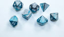 A set of eight Mini Gemini RPG dice featuring a vibrant steel-teal and white color scheme, showcasing various shapes like d4, d6, d8, d10, d12, and d20. The dice have clear, easy-to-read numbers and a glossy finish, perfect for tabletop role-playing games.