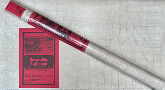 Chessex Double-Sided Battlemat featuring a 23" x 26" vinyl surface. The mat is rolled up, showcasing a grid pattern ideal for tabletop games, alongside an instruction card.