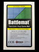 Chessex Blu/Grn Reversible Battle Mat featuring a durable, two-color vinyl surface. The mat measures 23.5" x 26" with a 1" square grid pattern, ideal for tabletop games and providing a stable playing surface. The mat is easily rolled for storage and includes guidelines for game layout.