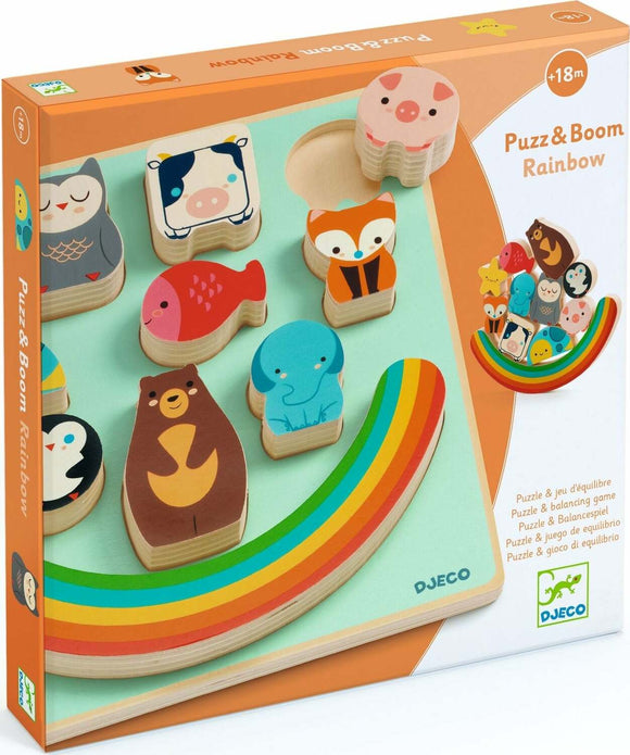 Puzz & Boom Rainbow by DJECO is a colorful balancing game suitable for children aged 18 months and older. The box features a rainbow design with various wooden animal pieces, including a cow, owl, fish, bear, and elephant, designed for interactive play that enhances fine motor skills and cognitive development.