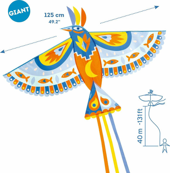 A giant bird-shaped kite by DJECO, featuring vibrant colors and intricate designs. The kite measures 125 cm (49.2 inches) and includes long colorful tails. It is ideal for outdoor fun and encourages creativity and play.
