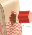 A close-up view of the Multi Boita by DJECO, showcasing its wooden design. The product features a flower-shaped red handle next to a cut-out hole, highlighting its interactive nature. Ideal for engaging young minds, it promotes fine motor skills and creativity.