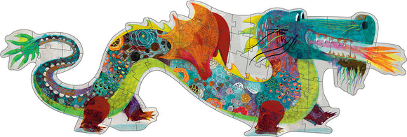 A colorful jigsaw puzzle shaped like a dragon, designed by DJECO. The dragon features a vibrant design with splashes of greens, oranges, and blues, and has intricate patterns on its body, making it visually engaging for children.