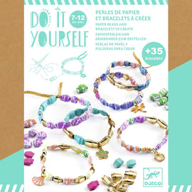 A colorful DIY kit for creating paper beads and bracelets by DJECO. The kit showcases multiple finished bracelets made from vibrant paper beads and metallic accents, surrounded by additional beads ready for crafting. Suitable for children aged 7-12 years.