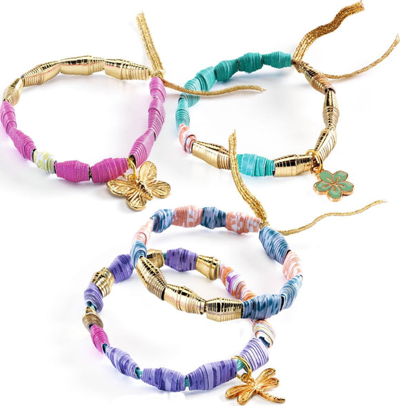 A collection of colorful paper bead bracelets made by DJECO. Each bracelet features a mix of vibrant paper rolls and shiny gold accents. Some have decorative charms like a butterfly and a flower, showcasing a creative DIY craft perfect for kids.