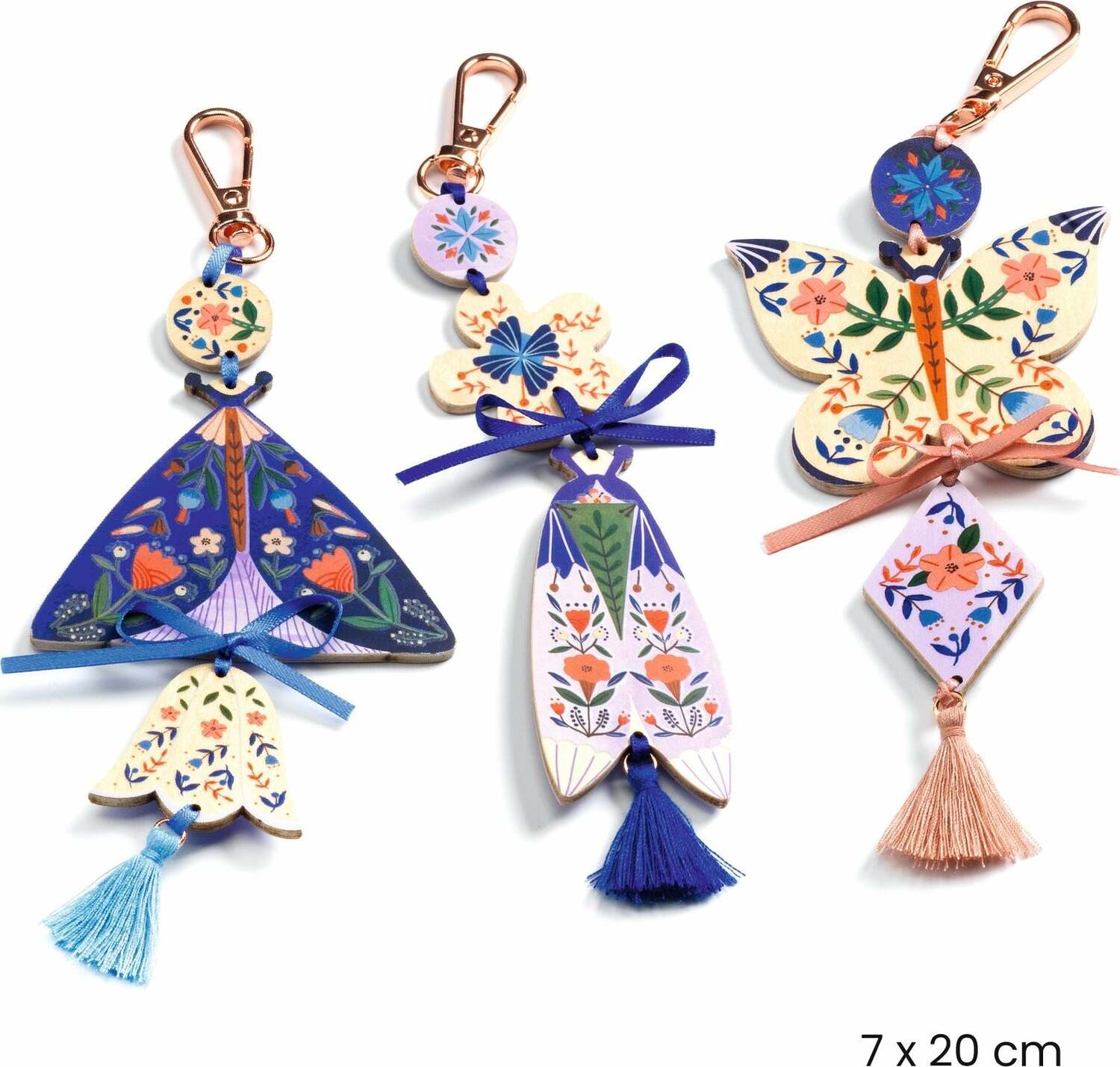 Colorful DIY Butterflies Bag Charms set featuring three decorative charms with floral designs. The charms include a butterfly, floral shapes, and tassels, perfect for personalizing bags. Each charm is attached with a rose-colored clasp, and the entire set measures 7 x 20 cm.