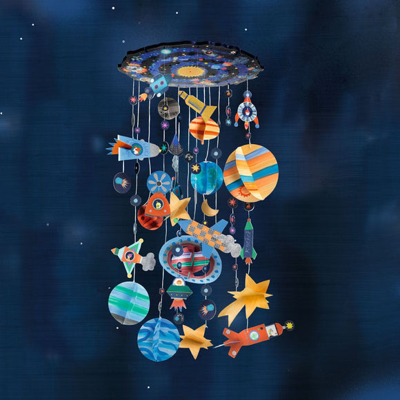 A colorful Solar System decorative mobile featuring planets, stars, rockets, and other celestial designs. Each element is suspended from a circular top, creating a whimsical, celestial-themed decor piece. Ideal for children’s rooms or educational spaces.