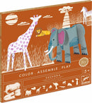 The Savanna Color. Assemble. Play DIY kit by DJECO features vibrant paper cutouts of various savanna animals such as a giraffe, lion, and elephant. The kit encourages children to color, assemble, and play with their own handcrafted animal figures in a creatively illustrated savanna landscape.