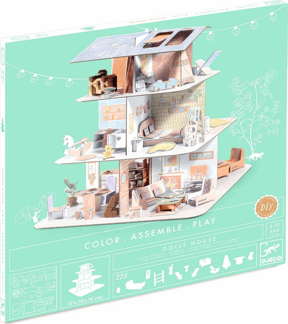 A colorful DIY dollhouse kit from DJECO titled 'Color. Assemble. Play.' The box features a 3D illustration of a stylish, multi-level dollhouse with various furniture pieces and decor spread across different rooms, inviting creativity and imaginative play.