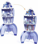 A colorful DIY kit featuring a space rocket model, designed for children. The rocket is printed with vibrant illustrations of astronauts and space equipment. It can be assembled and disassembled, promoting imaginative play and creativity.