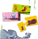 A colorful jigsaw puzzle featuring cute illustrations of animals, including two owls on a branch, a monkey and a red monkey on a vine, a brown bear resting, and two sleeping elephants. The design is playful and ideal for young children, showcasing vibrant colors and engaging characters.