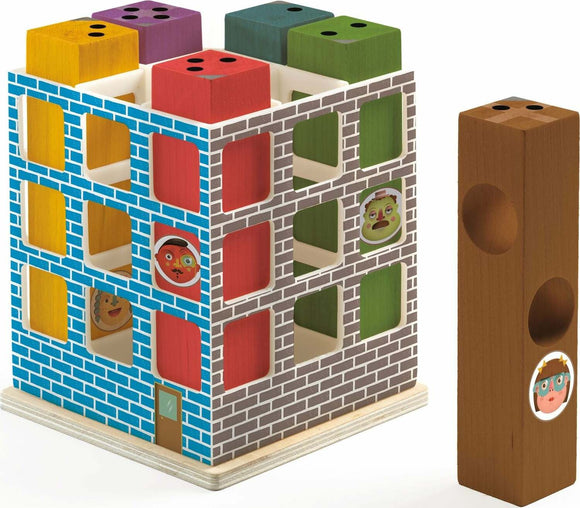 Hotelogic Solologic by DJECO is a colorful mechanical puzzle designed for children. The structure features various blocks in vibrant colors such as blue, red, green, and yellow, arranged in a playful building-like design. Each side showcases different cut-out shapes and playful character illustrations, promoting problem-solving skills and creativity.