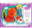 DJECO's Hidden in the Woods Paint with DIY kit features a vibrant illustration of a playful bear and its cub surrounded by colorful trees. The set includes a magic coloring pen that reveals hidden colors, encouraging creativity and imagination in children over 18 months.