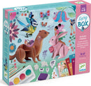 The Fairy Box Multi-Activity Kit by DJECO features vibrant illustrations of animals, fairies, and flowers on its packaging. Art supplies including paints, stamps, and glitter are displayed, inviting creativity for ages 6-10.