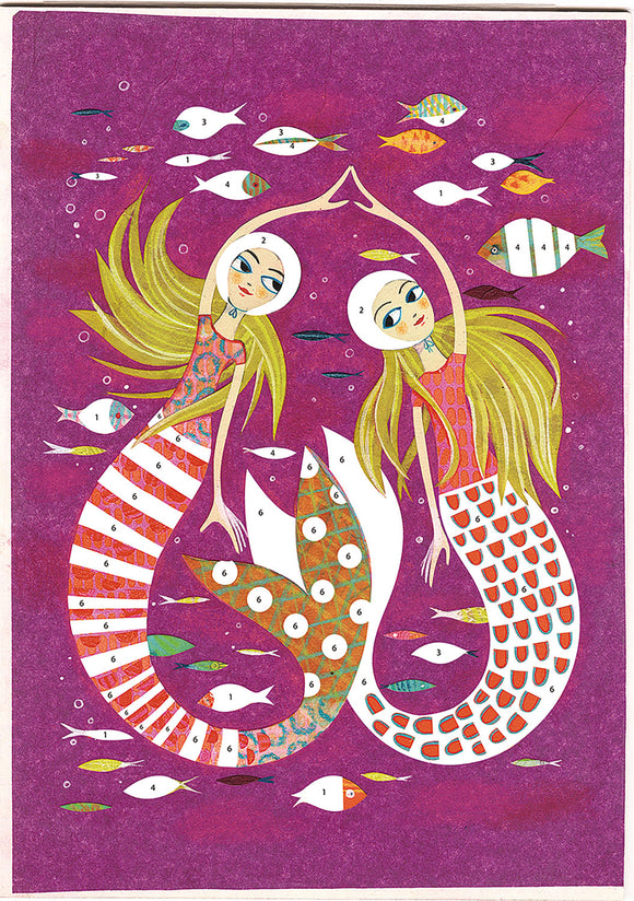 Mermaid Lights Glitter Boards by DJECO featuring two beautifully illustrated mermaids with flowing hair surrounded by colorful fish on a vibrant purple background. This DIY kit encourages creativity and artistic expression.