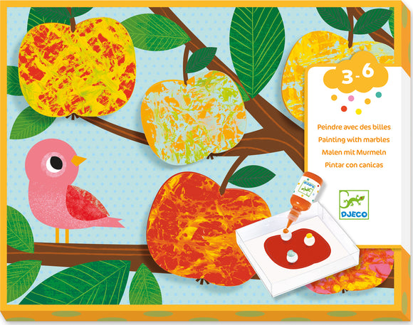 DJECO's Nature Painting Marble Painting DIY kit for children aged 3-6. The image features a playful design with colorful apples and a cute bird. It showcases the paint application process using marbles, encouraging creativity and artistic exploration.