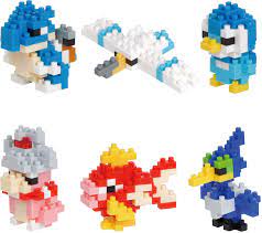 Nanoblock Water Set 1 featuring six colorful, intricately designed block models. Includes a blue bird, a white swan, a penguin, a fish, a character in a red outfit, and a colorful bird. Perfect for creative building and imaginative play.