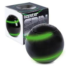 Glow in the dark spin ball with its packaging behind it.