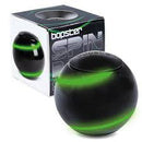 Glow in the dark spin ball with its packaging behind it.