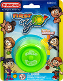 Bright green 'First Yo!' yo-yo from Duncan, designed for ages 5 and up. The packaging features engaging cartoon characters demonstrating its use, with a warning about small parts and choking hazards.